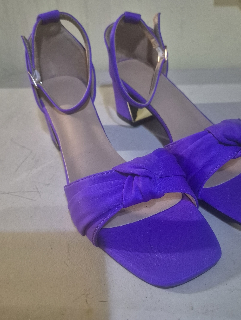 Knot-Front Ankle-Strap Block Heels in Vibrant Purple.   Box 40